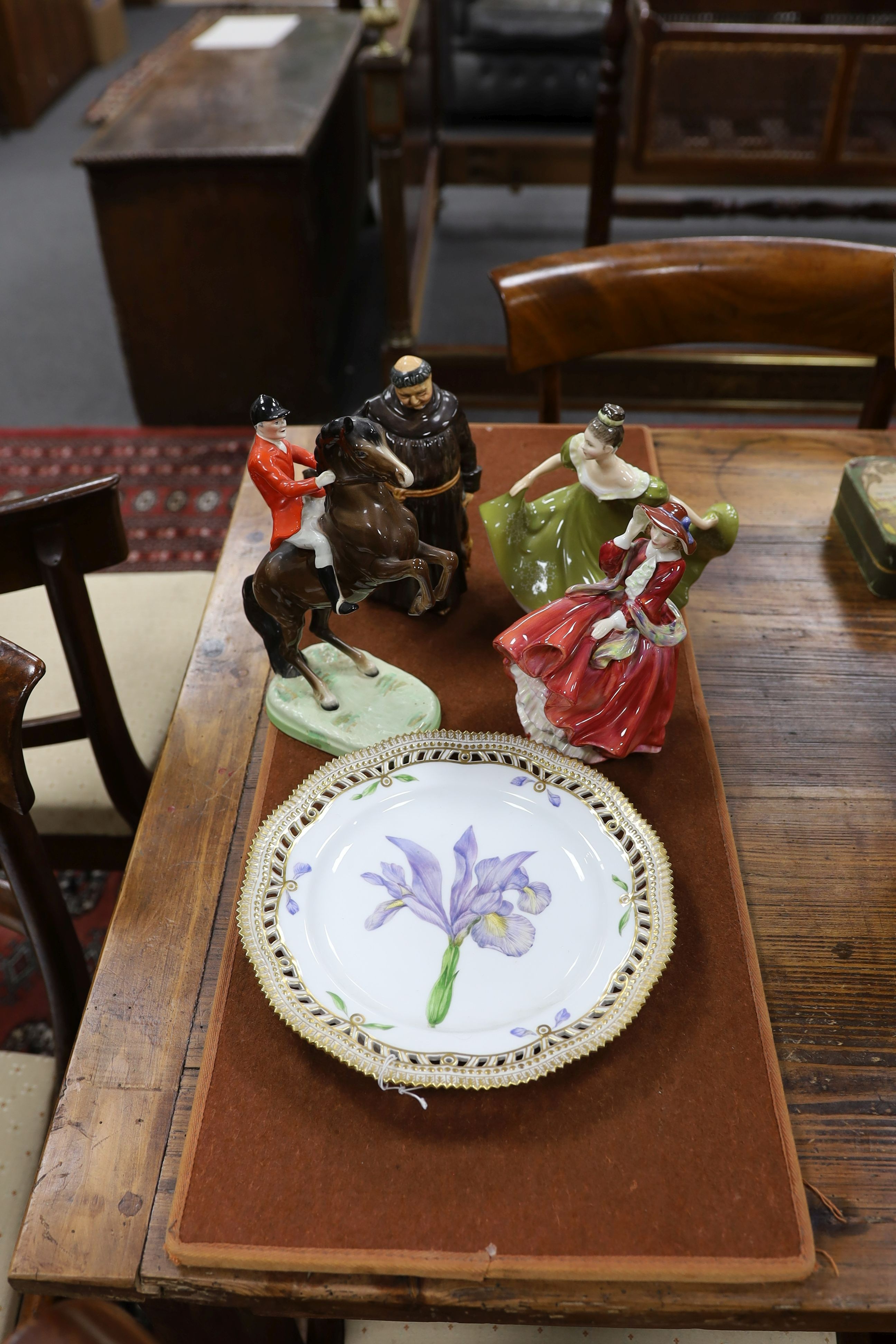 A Copenhagen porcelain botanical plate 'Prisspuria', a Beswick rearing horse huntsman and three Doulton figures (5)